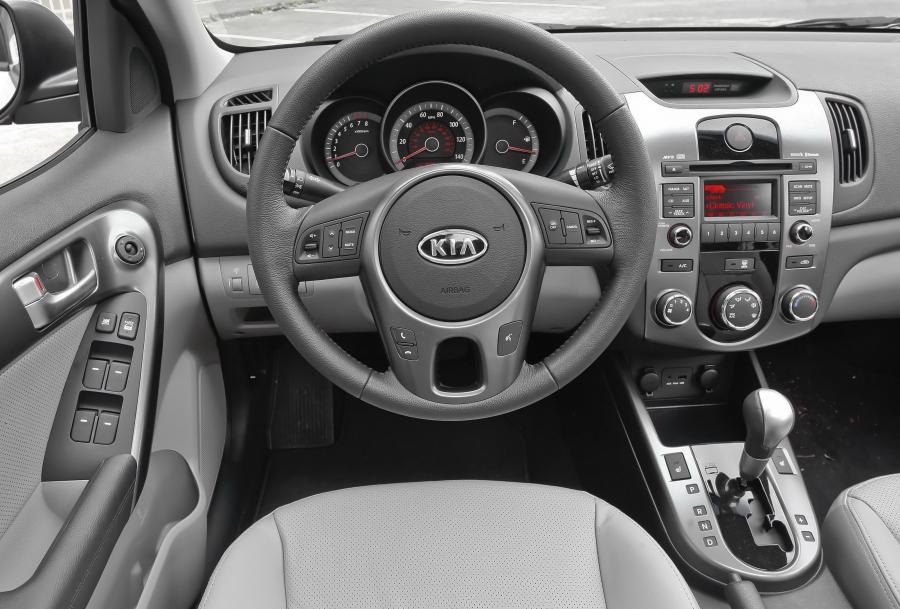  Kia Forte 2009 года  (фото 65 из 128)